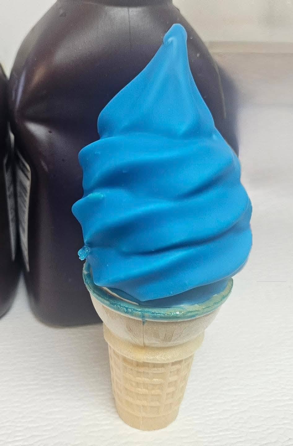 Blue raspberry soft serve cone